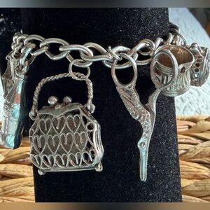Vintage Sterling silver 925 12 charm bracelet